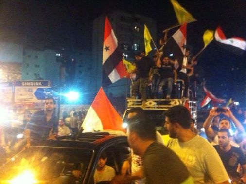 Hezbollah supporters celebrating 'victory' in Qusayr